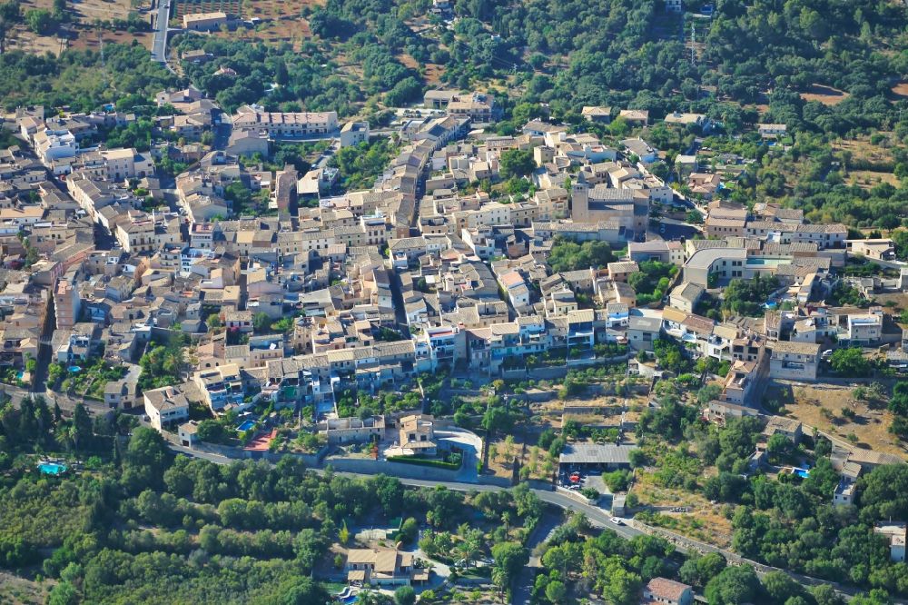 Aerial image Muro - Town View of the streets and houses of the residential areas in Muro in Balearic island of Mallorca, Spain