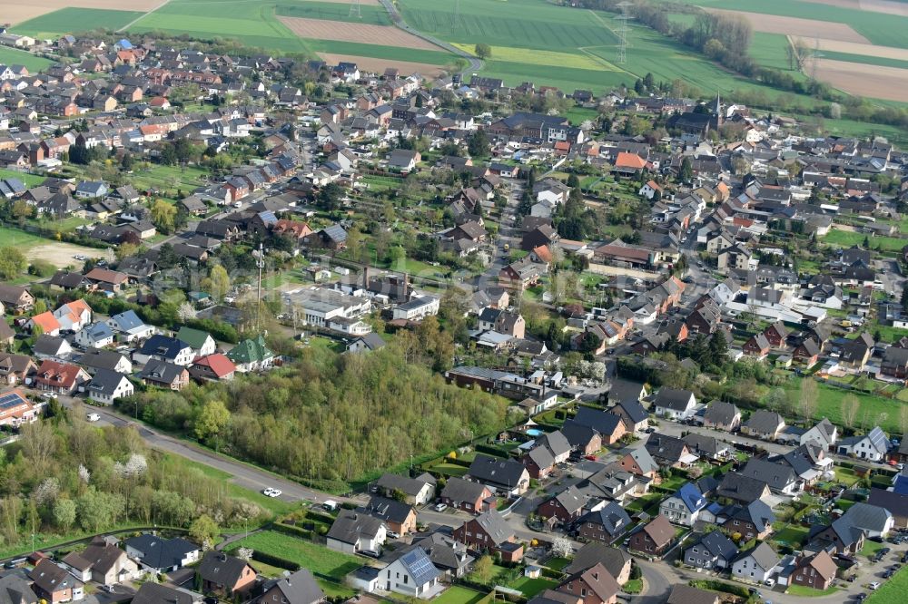 Niederzier from above - Town View of the streets and houses of the residential areas in Niederzier in the state North Rhine-Westphalia