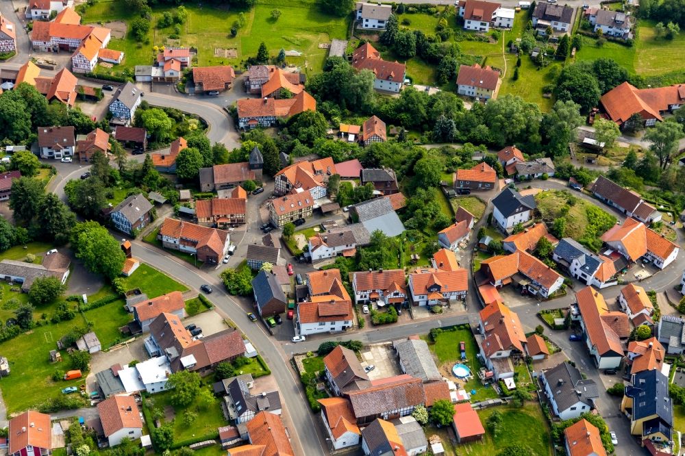 Aerial image Odershausen - Town View of the streets and houses of the residential areas in Odershausen in the state Hesse, Germany