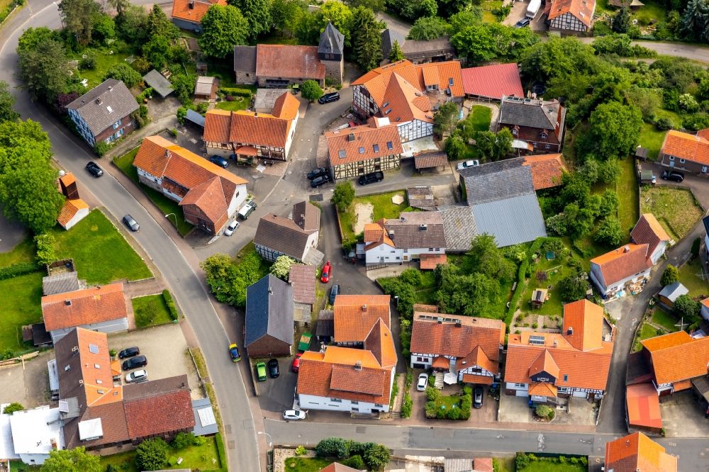 Odershausen from above - Town View of the streets and houses of the residential areas in Odershausen in the state Hesse, Germany