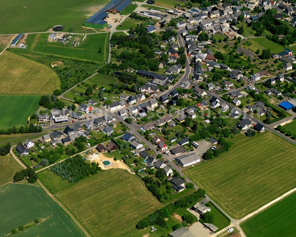 Aerial image Kempfeld - View of Kempfeld in the state of Rhineland-Palatinate. The borough and municipiality is an official spa resort and located in the county district of Birkenfeld, in the Hunsrueck region. It is surrounded by agricultural land, meadows and forest and includes three hamlets such as Katzenloch