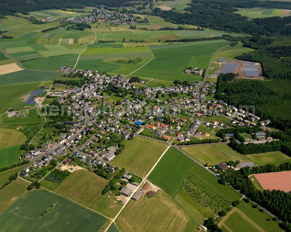 Kempfeld from above - View of Kempfeld in the state of Rhineland-Palatinate. The borough and municipiality is an official spa resort and located in the county district of Birkenfeld, in the Hunsrueck region. It is surrounded by agricultural land, meadows and forest and includes three hamlets such as Katzenloch