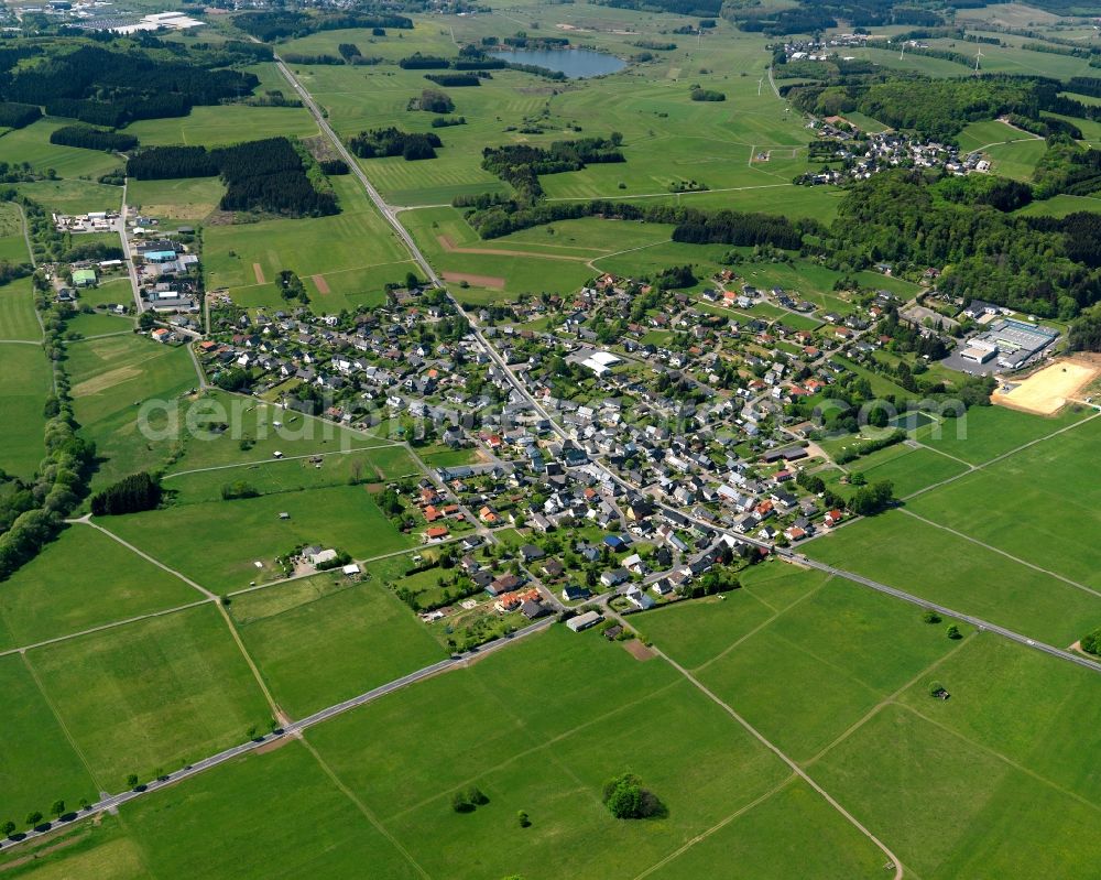 Rehe from above - View of the borough of Rehe in the state of Rhineland-Palatinate. The borough is located in the county district and region of Westerwald. The residential village is surrounded by fields and meadows and sits on federal highway B255