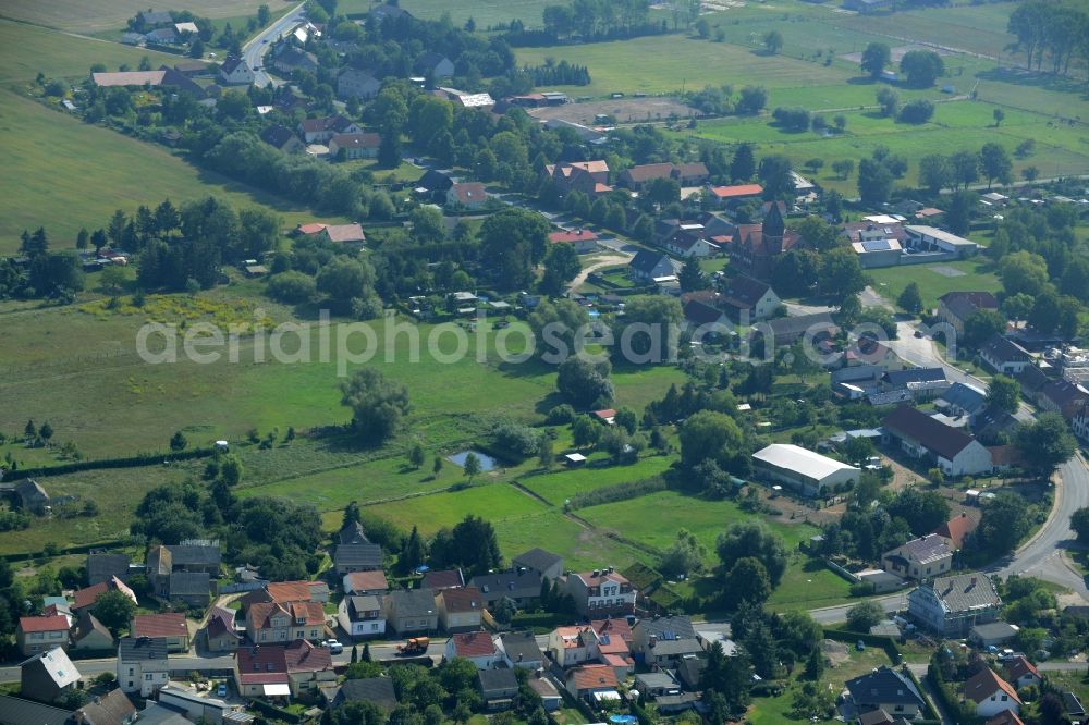 Spreenhagen from above - View of the main village of the borough of Spreenhagen in the state of Brandenburg. View along the main road L23 where residential buildings and agricultural businesses are located. Spreenhagen is located in the county district of Oder-Spree