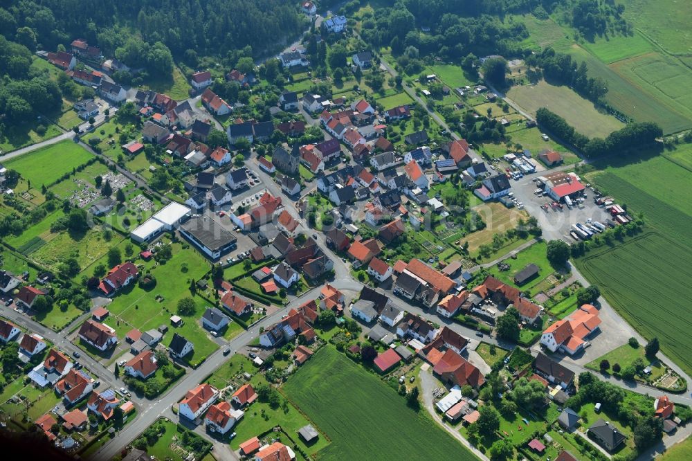 Ostheim from above - Town View of the streets and houses of the residential areas in Ostheim in the state Hesse, Germany