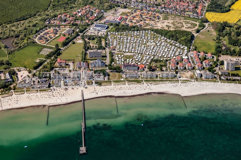 Großenbrode from above - Townscape on the seacoast of Baltic Sea with sandy beach Suedstrand Grossenbrode and campsite in Grossenbrode in the state Schleswig-Holstein