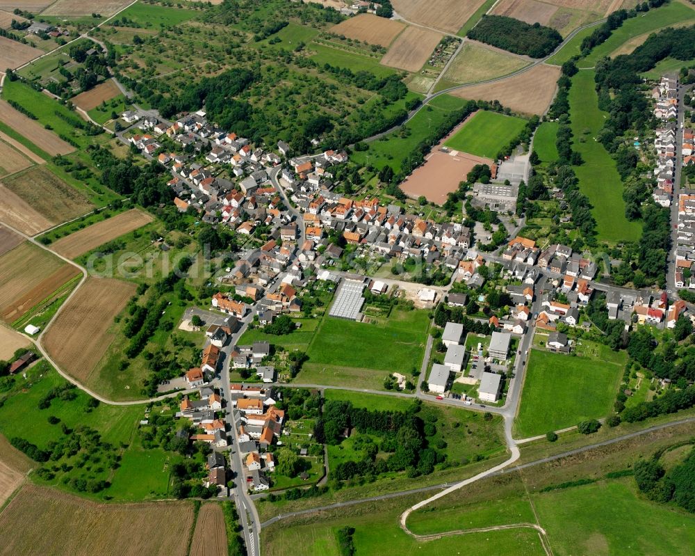 Allendorf a. d. Lahn from the bird's eye view: Village view on the edge of agricultural fields and land in Allendorf a. d. Lahn in the state Hesse, Germany