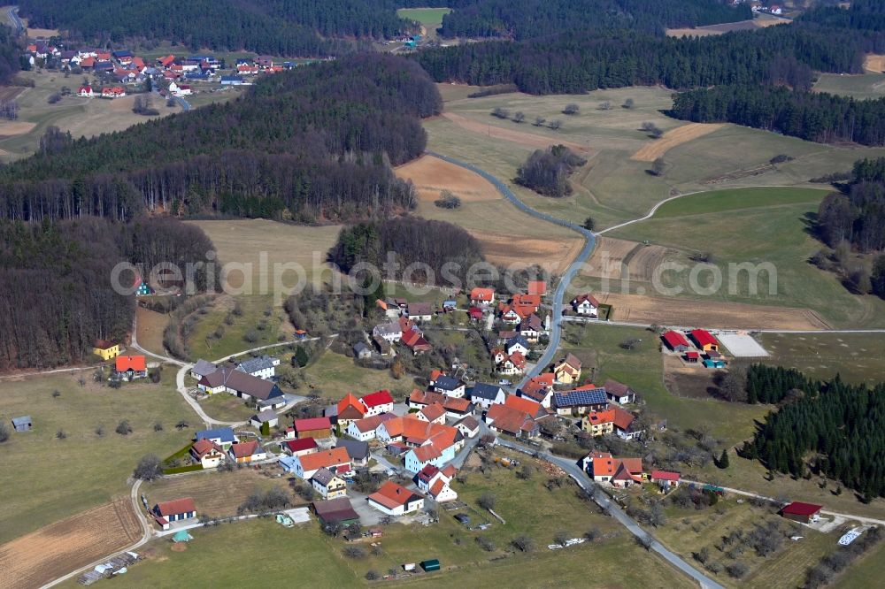 Allersdorf from the bird's eye view: Village view on the edge of agricultural fields and land in Allersdorf at Fraenkische Schweiz in the state Bavaria, Germany