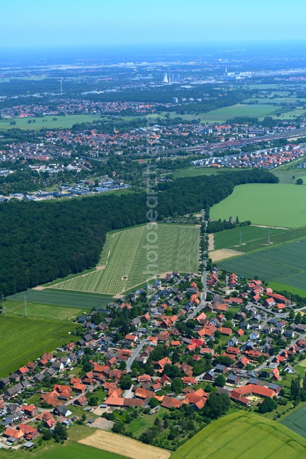 Aerial photograph Almhorst - Village view on the edge of agricultural fields and land in Almhorst in the state Lower Saxony, Germany