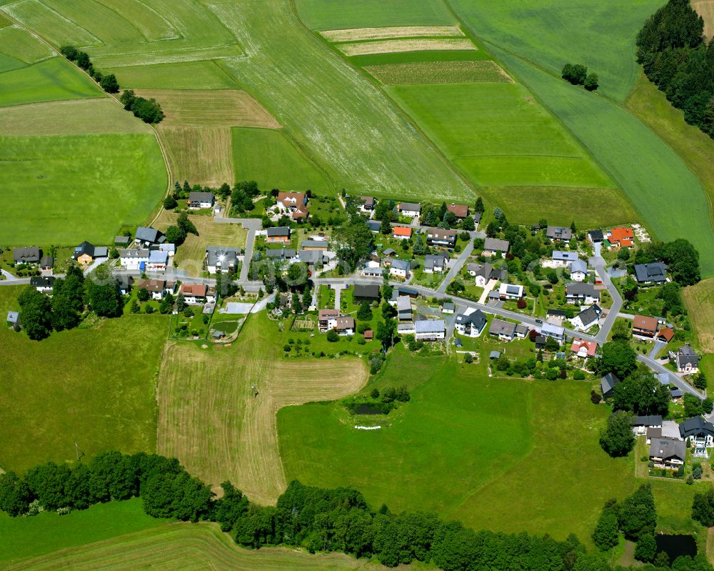 Bad Steben from the bird's eye view: Village view on the edge of agricultural fields and land on street Bachwiesenstrasse in the district Obersteben in Bad Steben Oberfranken in the state Bavaria, Germany