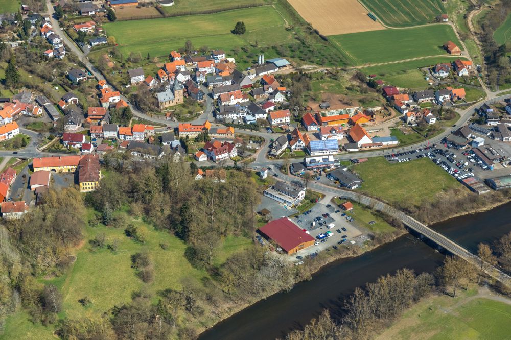 Aerial image Bahnhof - Village view on the edge of agricultural fields and land in Bahnhof in the state Hesse, Germany