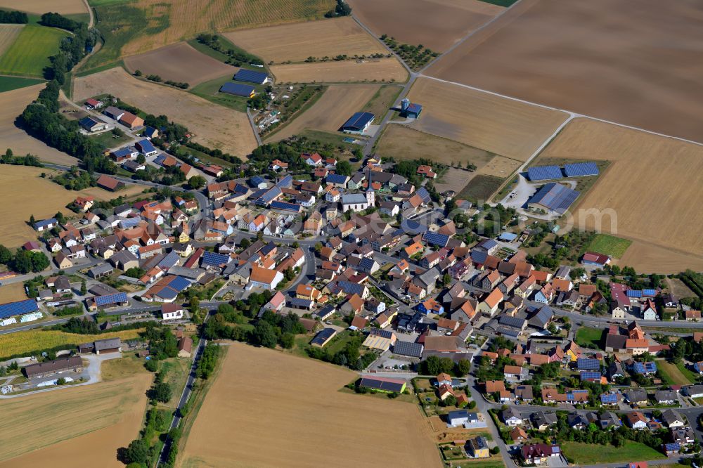 Baldersheim from above - Village view on the edge of agricultural fields and land in Baldersheim in the state Bavaria, Germany