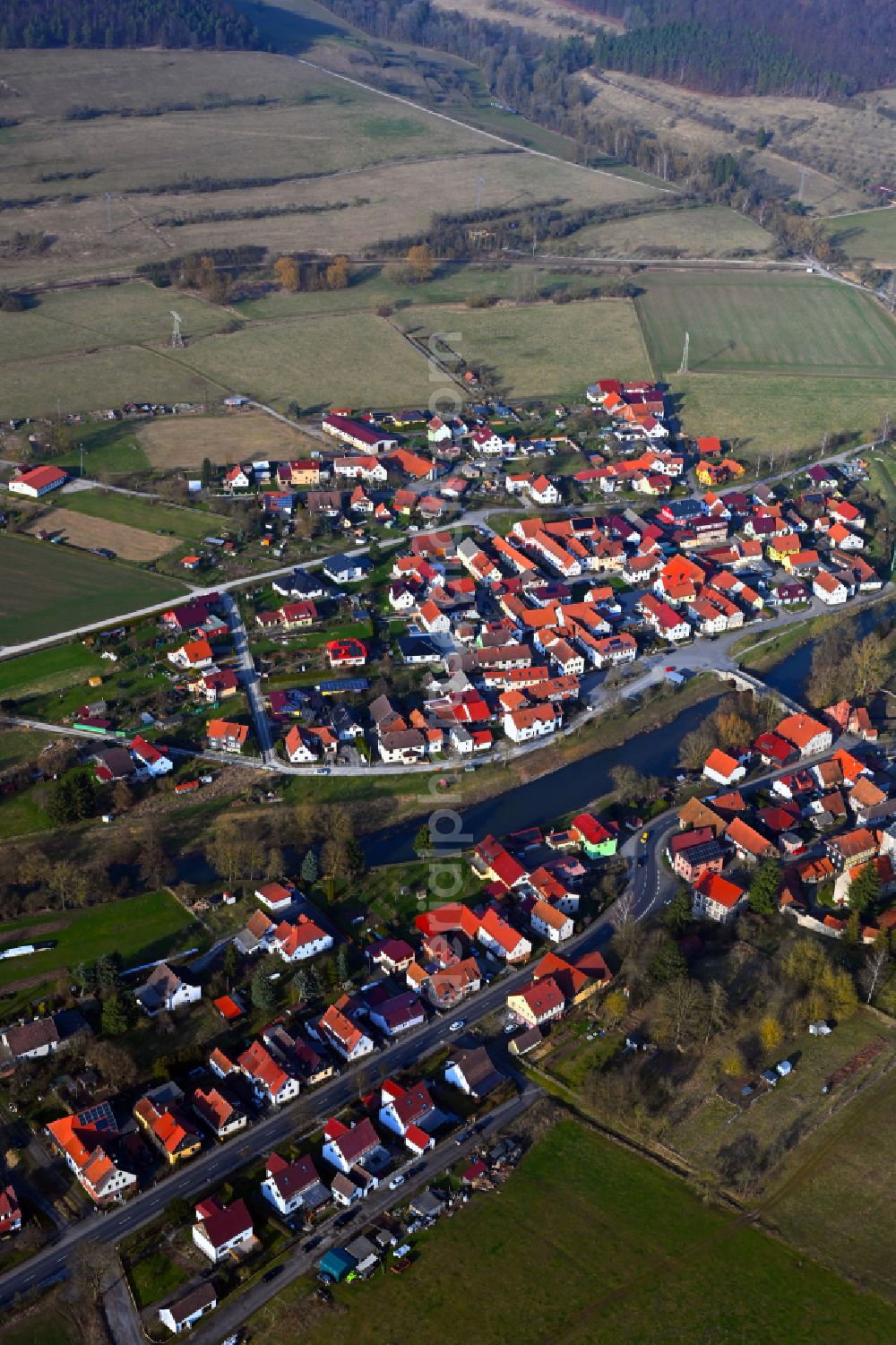 Belrieth from the bird's eye view: Village view on the edge of agricultural fields and land on street B89 in Belrieth in the state Thuringia, Germany