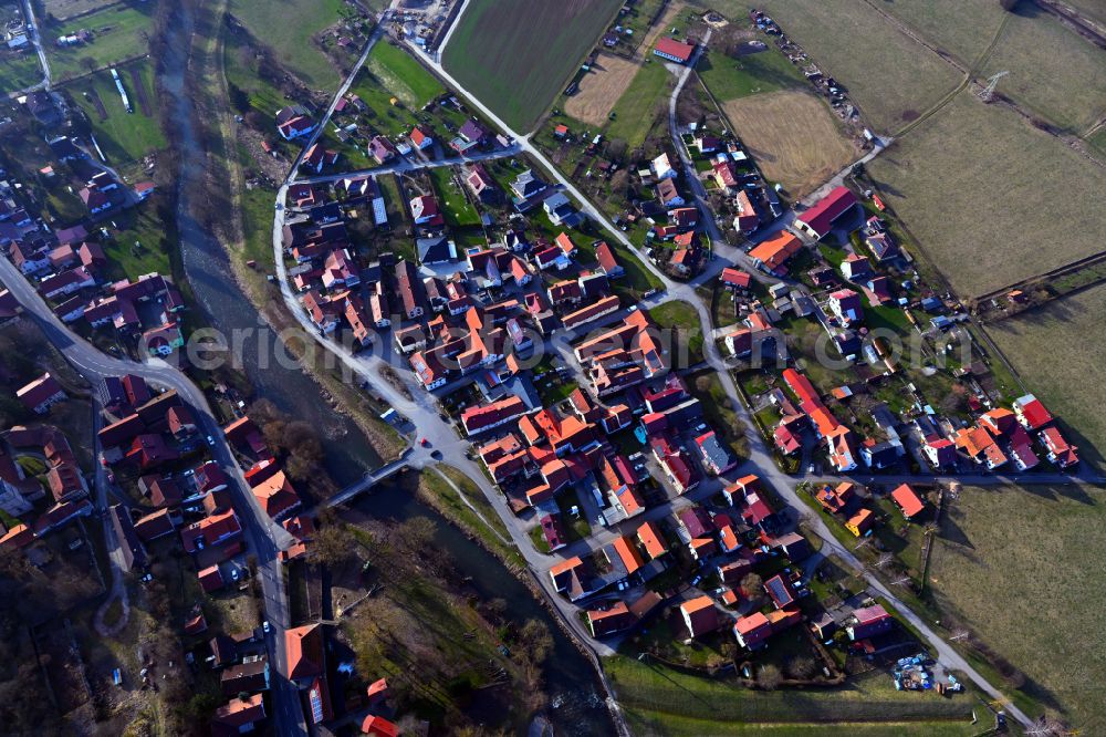 Aerial photograph Belrieth - Village view on the edge of agricultural fields and land on street B89 in Belrieth in the state Thuringia, Germany