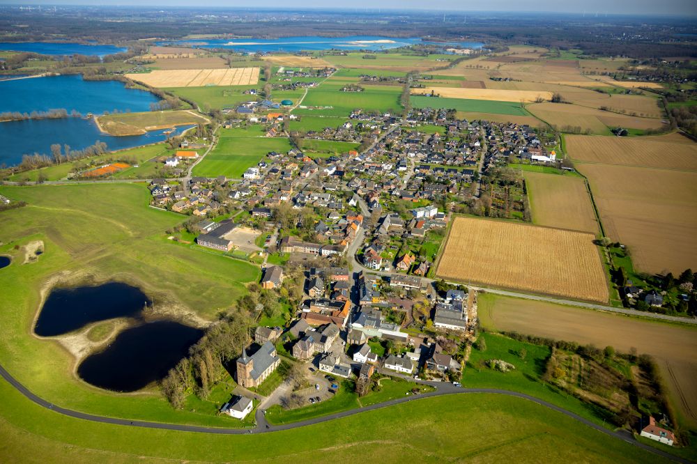 Bislich from above - Village view on the edge of agricultural fields and land in Bislich in the state North Rhine-Westphalia, Germany
