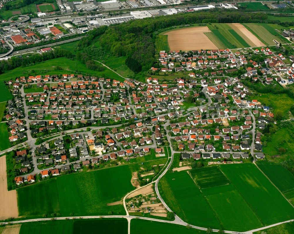Bünzwangen from the bird's eye view: Village view on the edge of agricultural fields and land in Bünzwangen in the state Baden-Wuerttemberg, Germany
