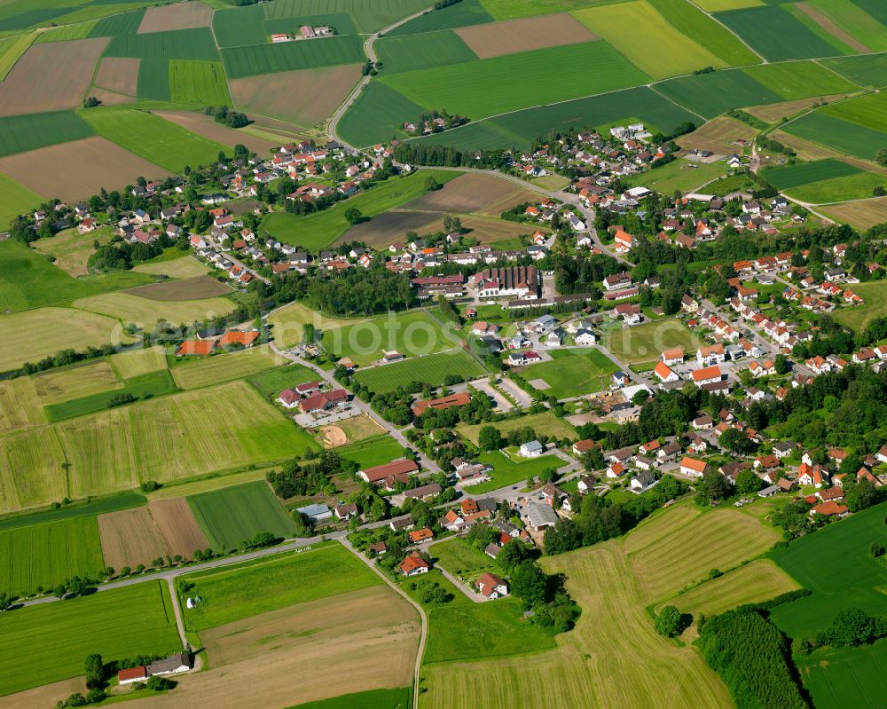 Aerial image Burgrieden - Village view on the edge of agricultural fields and land in Burgrieden in the state Baden-Wuerttemberg, Germany