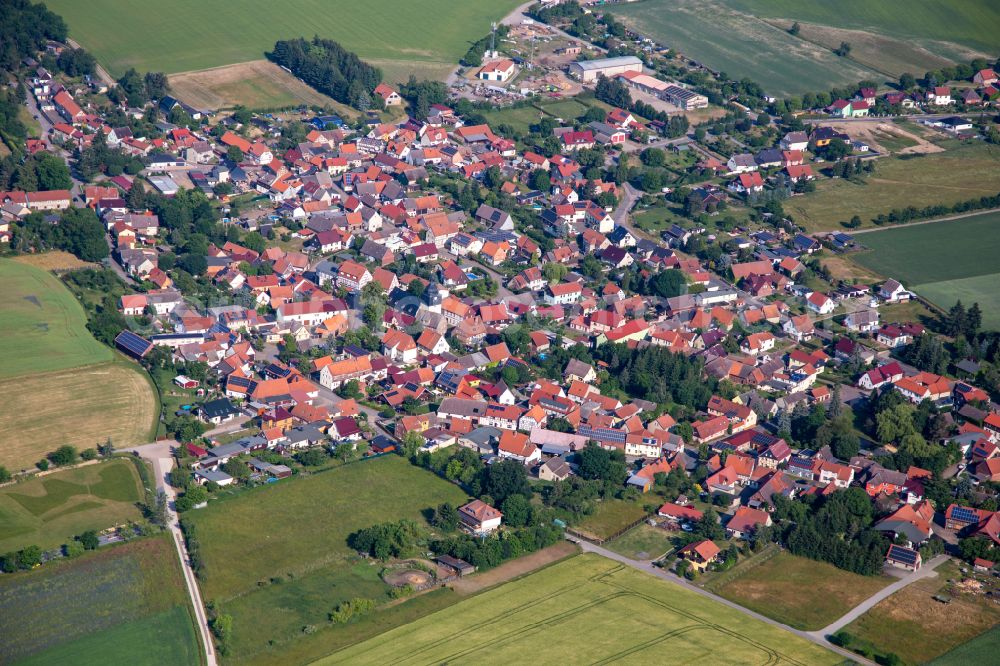 Dankerode from above - Village view on the edge of agricultural fields and land on street Kreisstrasse in Dankerode in the state Saxony-Anhalt, Germany