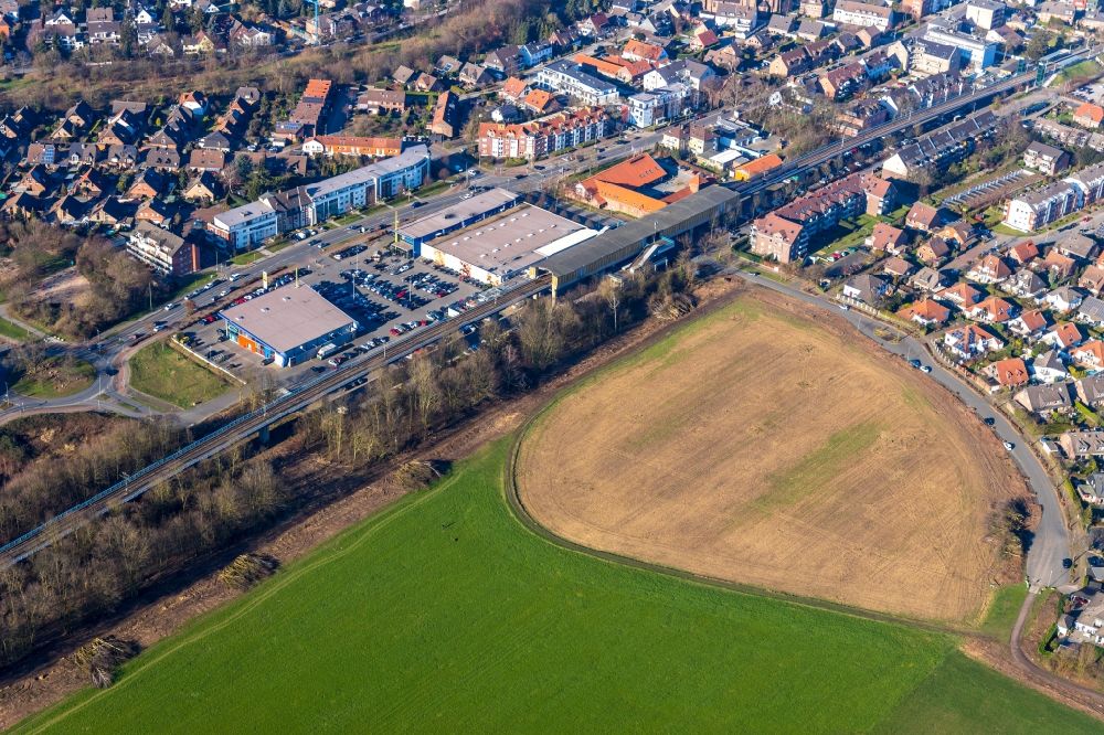 Duisburg from above - Village view on the edge of agricultural fields and land along the local rail course and the Duesseldorfer Landstrasse in the district Huckingen in Duisburg in the state North Rhine-Westphalia, Germany