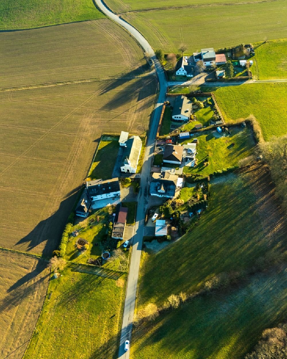 Ennepetal from the bird's eye view: Village view on the edge of agricultural fields and land along the Koenigsfelder Strasse in Ennepetal in the state North Rhine-Westphalia, Germany
