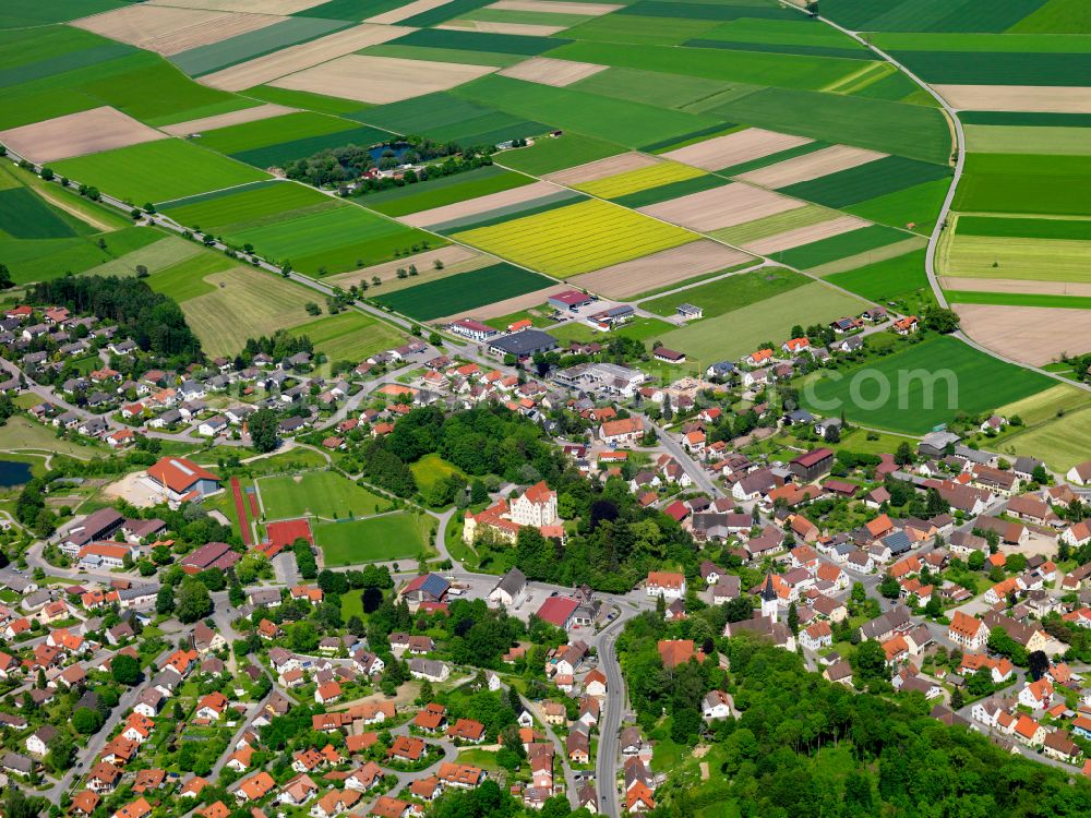 Erolzheim from the bird's eye view: Village view on the edge of agricultural fields and land in Erolzheim in the state Baden-Wuerttemberg, Germany