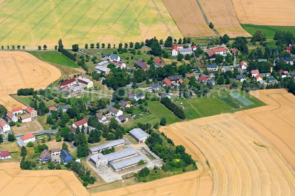 Falkenberg from the bird's eye view: Village view on the edge of agricultural fields and land in Falkenberg in the state Saxony, Germany
