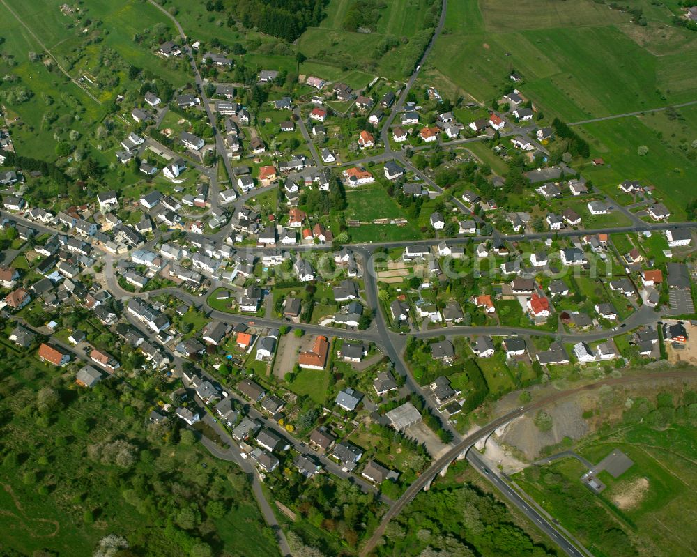 Aerial image Flammersbach - Village view on the edge of agricultural fields and land in Flammersbach in the state Hesse, Germany