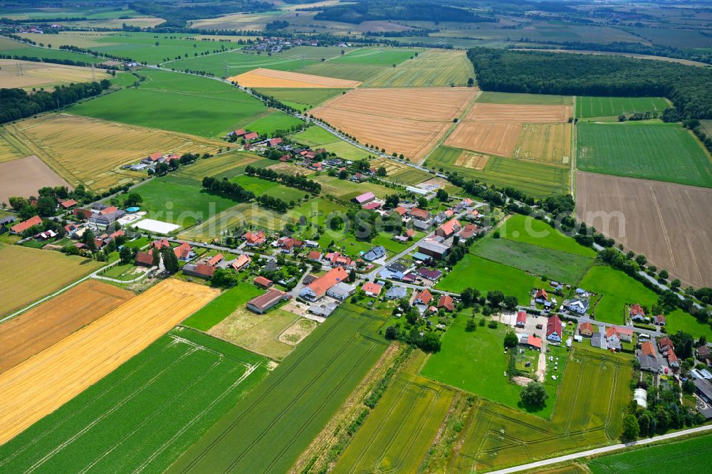 Aerial image Fredelsloh - Village view on the edge of agricultural fields and land in Fredelsloh in the state Lower Saxony, Germany