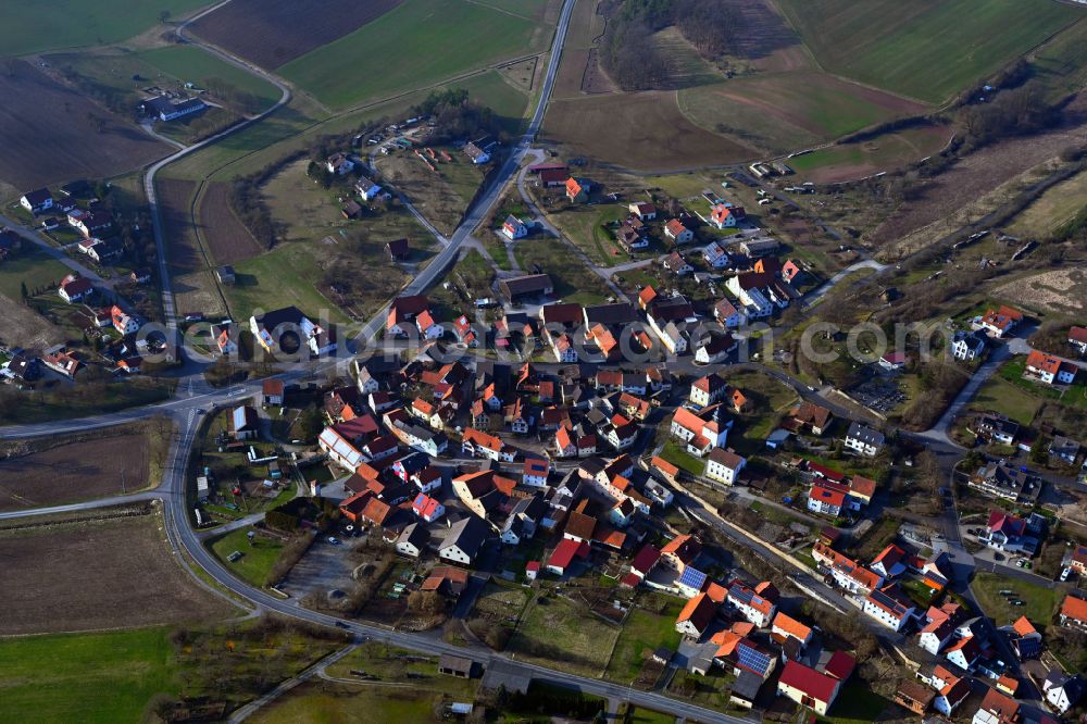 Aerial photograph Frickenhausen - Village view on the edge of agricultural fields and land in Frickenhausen in the state Bavaria, Germany