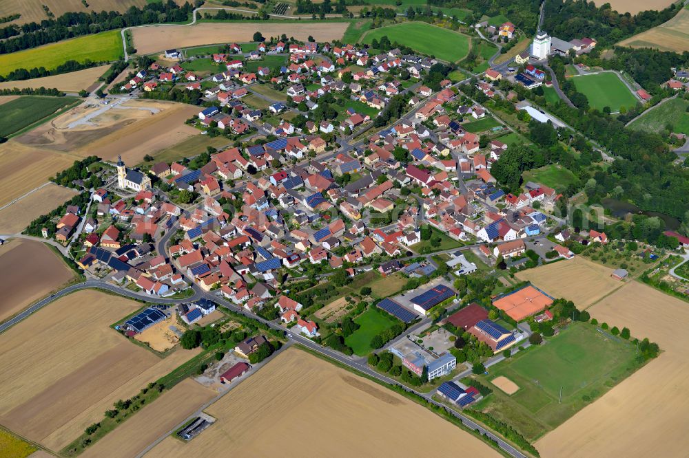Gaukönigshofen from the bird's eye view: Village view on the edge of agricultural fields and land in Gaukönigshofen in the state Bavaria, Germany