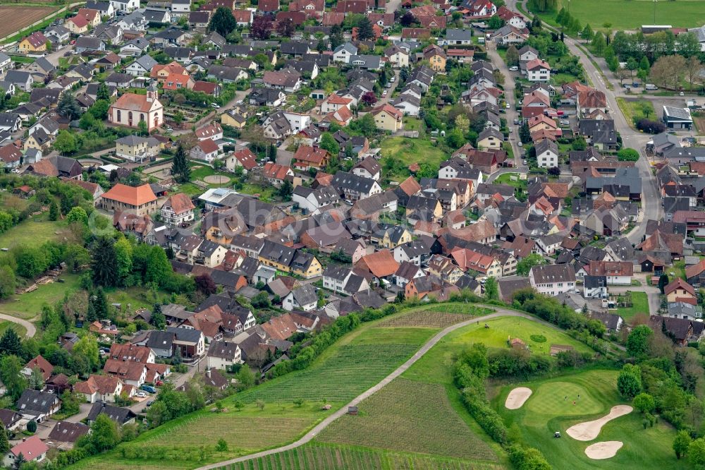 Aerial photograph Tutschfelden - Village view on the edge of agricultural fields and land and Golfgelaende in Tutschfelden in the state Baden-Wuerttemberg, Germany