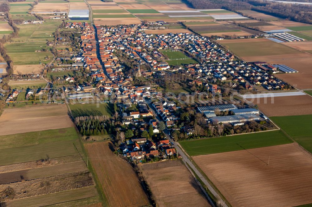 Gommersheim from the bird's eye view: Village view on the edge of agricultural fields and land in Gommersheim in the state Rhineland-Palatinate, Germany