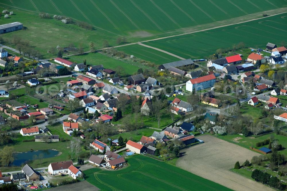 Groß Pinnow from the bird's eye view: Village view on the edge of agricultural fields and land in Gross Pinnow in the state Brandenburg, Germany