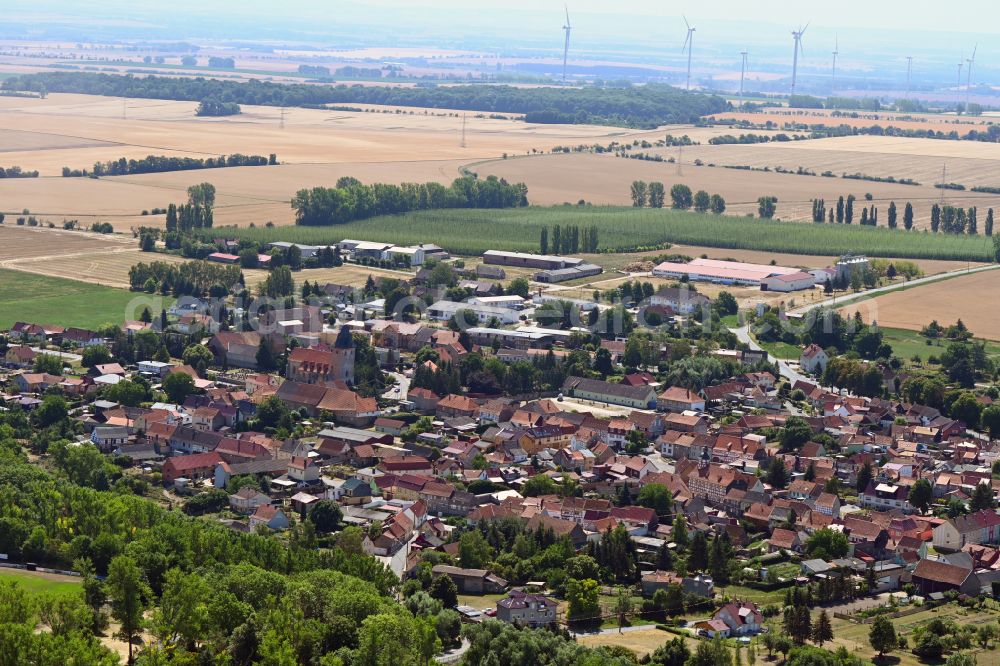 Aerial image Großenehrich - Village view on the edge of agricultural fields and land in Grossenehrich in the state Thuringia, Germany