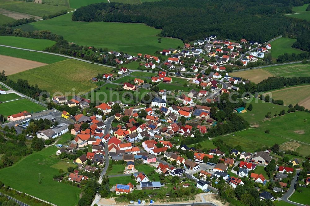 Gunzendorf from the bird's eye view: Village view on the edge of agricultural fields and land in Gunzendorf in the state Bavaria, Germany