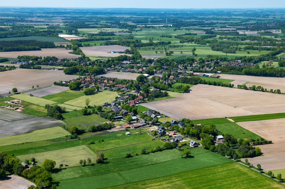 Aerial image Heinbockel - Village view on the edge of agricultural fields and land in Heinbockel in the state Lower Saxony, Germany
