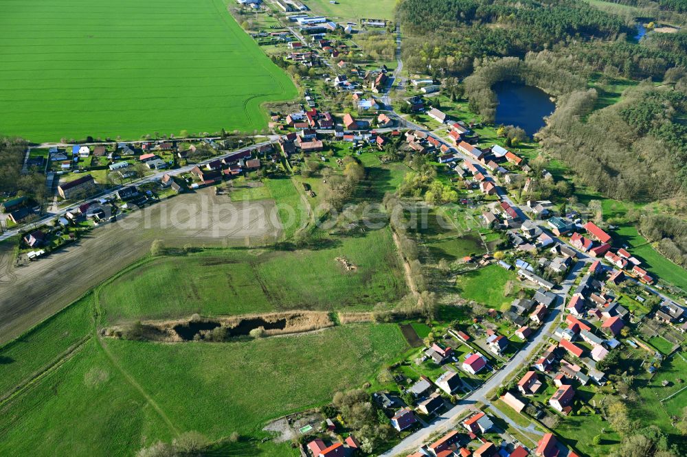 Herzsprung from above - Village view on the edge of agricultural fields and land in Herzsprung in the state Brandenburg, Germany