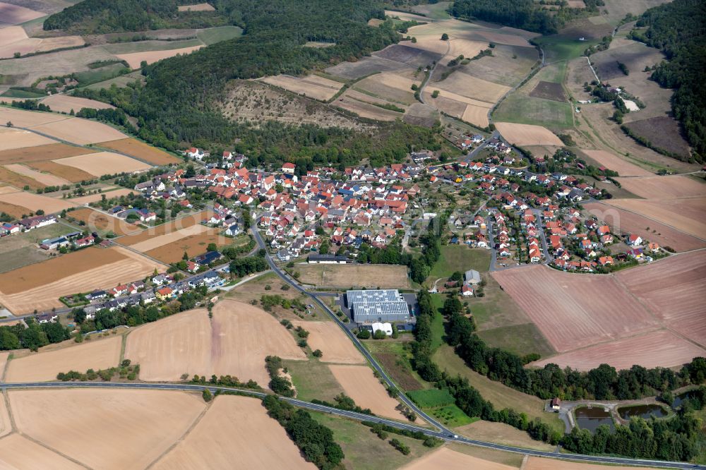 Heßdorf from above - Village view on the edge of agricultural fields and land in Heßdorf in the state Bavaria, Germany