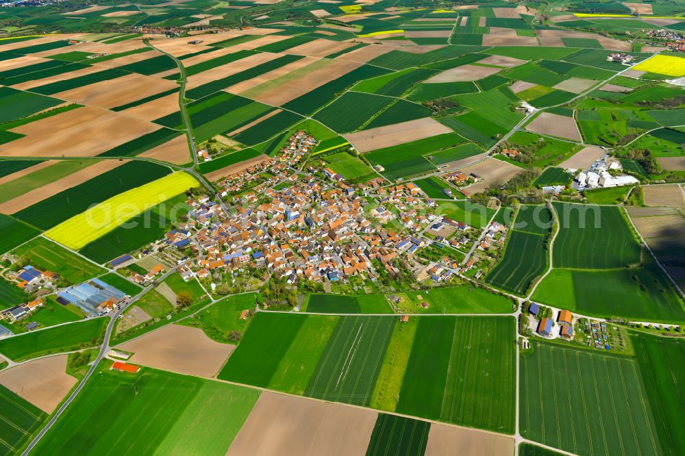 Hüttenheim from above - Village view on the edge of agricultural fields and land in Hüttenheim in the state Bavaria, Germany