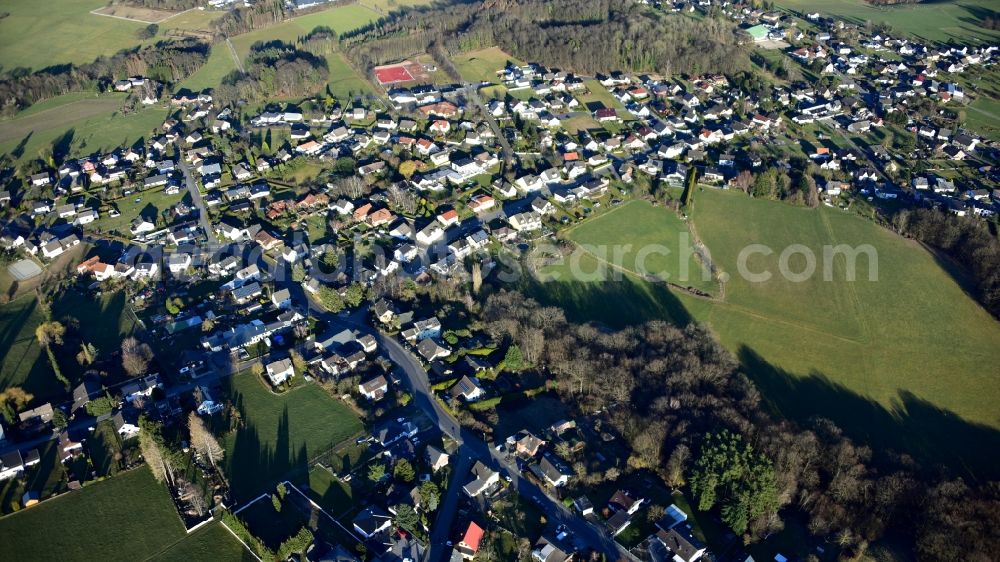 Kölsch-Büllesbach from the bird's eye view: Village view on the edge of agricultural fields and land in Koelsch-Buellesbach in the state Rhineland-Palatinate, Germany