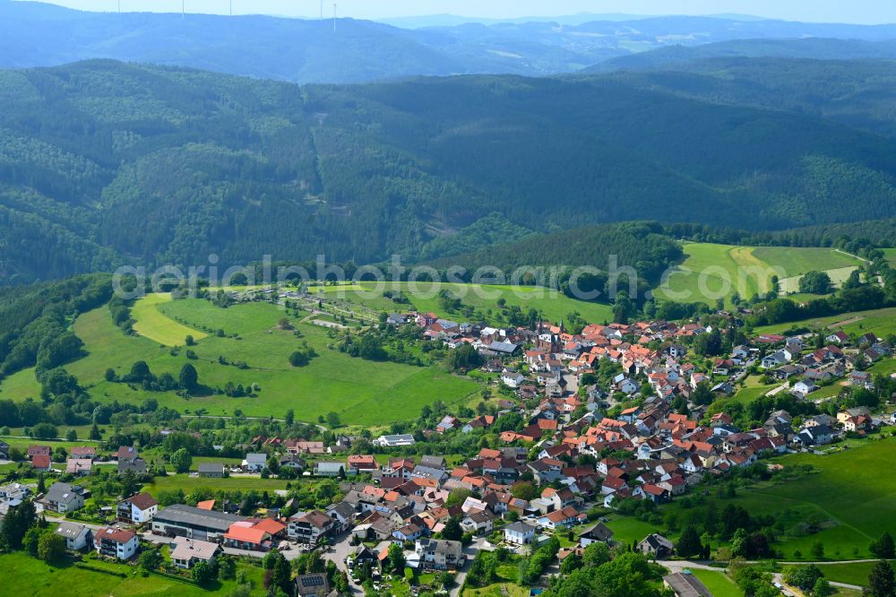 Kortelshütte from the bird's eye view: Village view on the edge of agricultural fields and land in Kortelshütte in the state Hesse, Germany