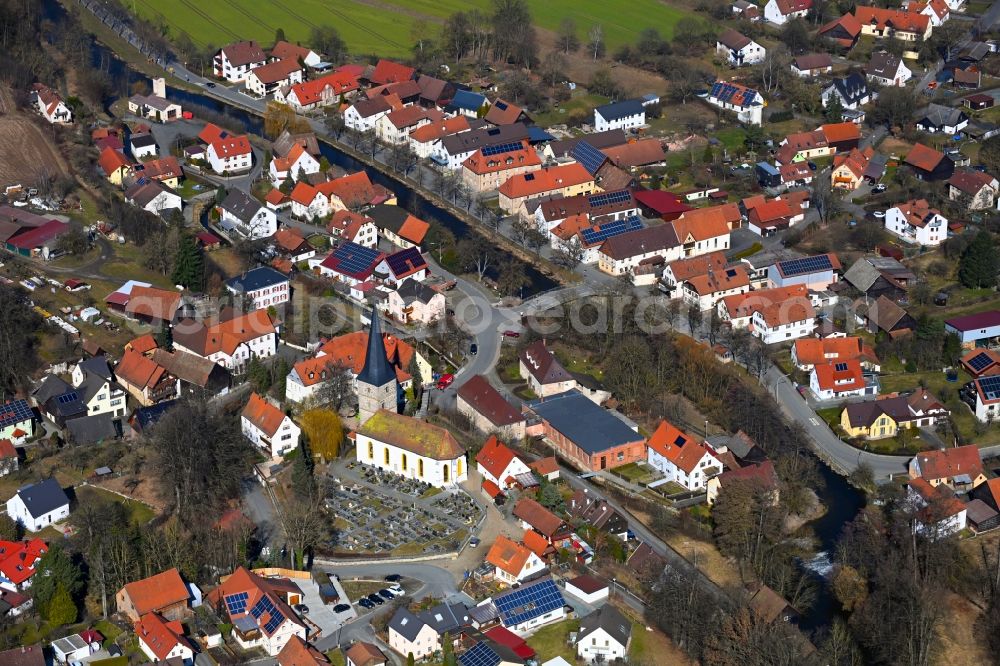 Lanzendorf from the bird's eye view: Village view on the edge of agricultural fields and land in Lanzendorf in the state Bavaria, Germany