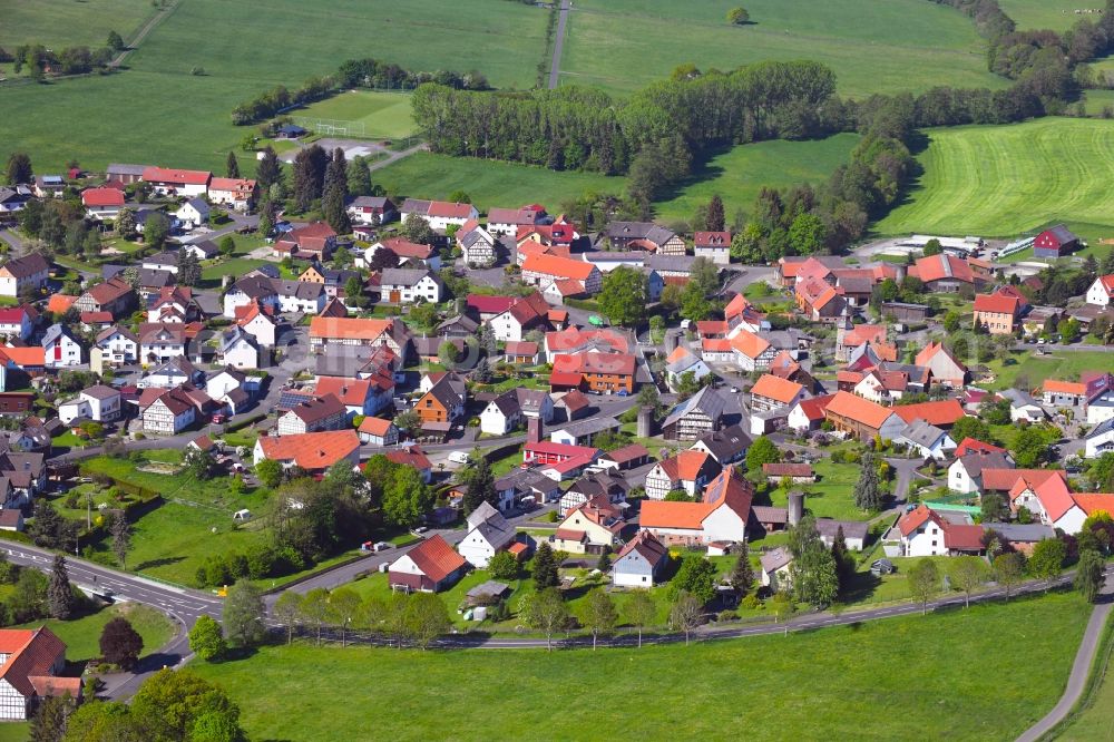 Lanzenhain from the bird's eye view: Village view on the edge of agricultural fields and land in Lanzenhain in the state Hesse, Germany