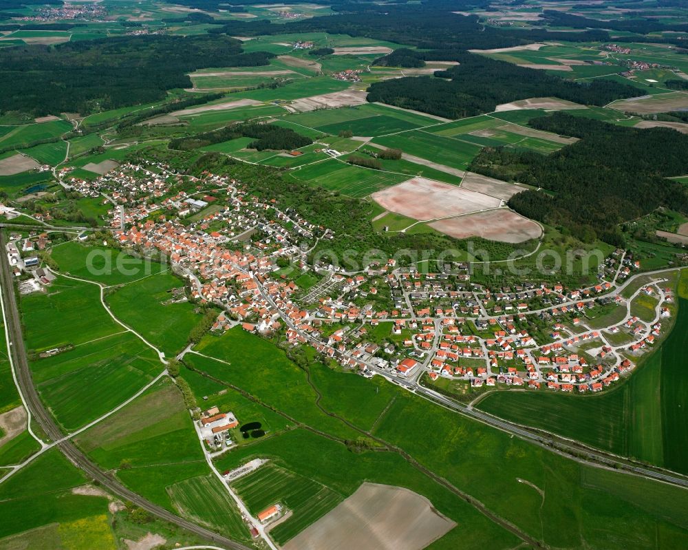 Lehrberg from the bird's eye view: Village view on the edge of agricultural fields and land in Lehrberg in the state Bavaria, Germany