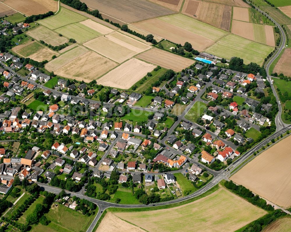 Aerial image Lützellinden - Village view on the edge of agricultural fields and land in Lützellinden in the state Hesse, Germany