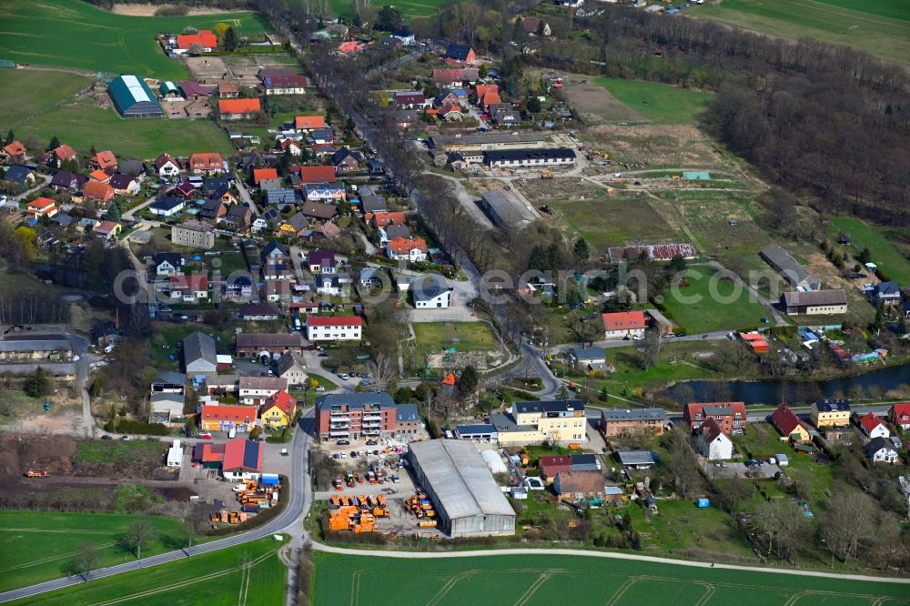 Mehrow from the bird's eye view: Village view on the edge of agricultural fields and land in Mehrow in the state Brandenburg, Germany