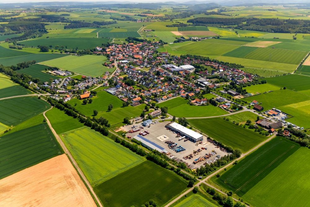 Meineringhausen from above - Village view on the edge of agricultural fields and land in Meineringhausen in the state Hesse, Germany