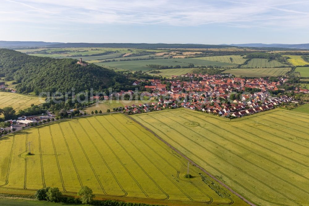 Mühlberg from the bird's eye view: Village view on the edge of agricultural fields and land in Muehlberg in the state Thuringia, Germany