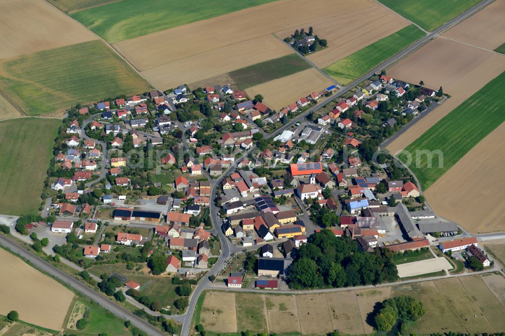 Moos from above - Village view on the edge of agricultural fields and land in Moos in the state Bavaria, Germany