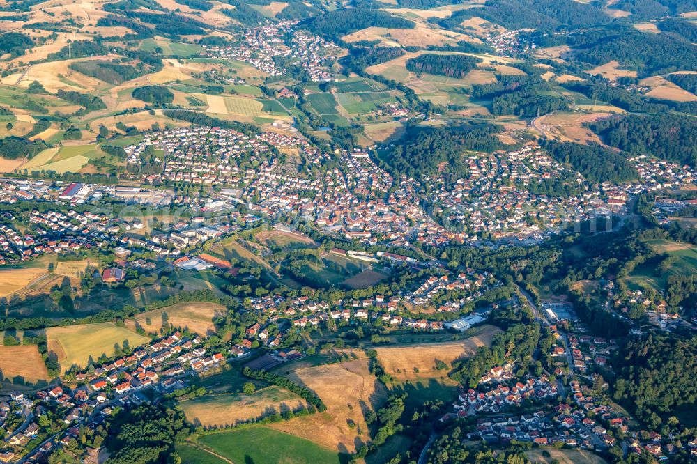 Mörlenbach from above - Village view on the edge of agricultural fields and land on street Friedgasse in Moerlenbach in the state Hesse, Germany